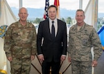 SpaceX CEO Elon Musk (center), the Commander, Air Force Space Command, and Joint Force Space Component Commander, Gen. Jay Raymond (left), and the Commander of the North American Aerospace Defense Command and U.S. Northern Command, U.S. Air Force General Terrence J. O’Shaughnessy pose for a photo in the command’s headquarters in Colorado Springs, Colorado, April 15, 2019. During Musk’s visit, he participated in conversations and round table briefings about future space operations and homeland defense innovation.