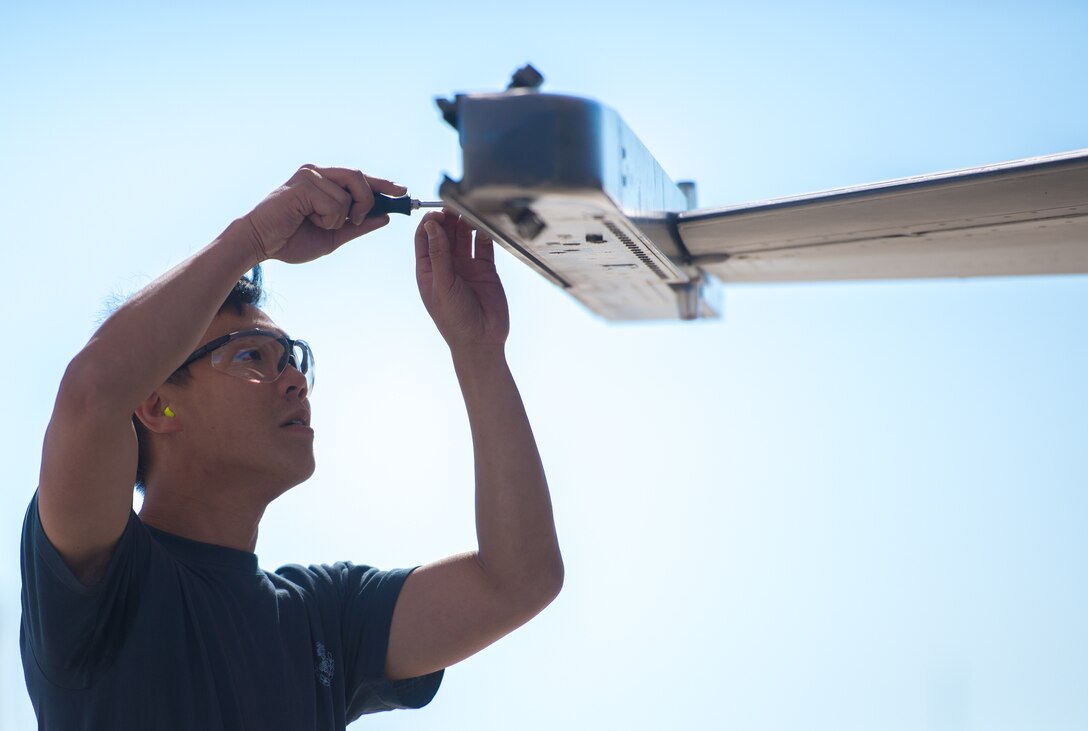 A Republic of Singapore Airman assigned to the 425th Fighter Squadron prepares an F-16 Fighting Falcon for inert munitions during the 1st Quarter Load Crew Competition, April 11, 2019, at Luke Air Force Base, Ariz.
