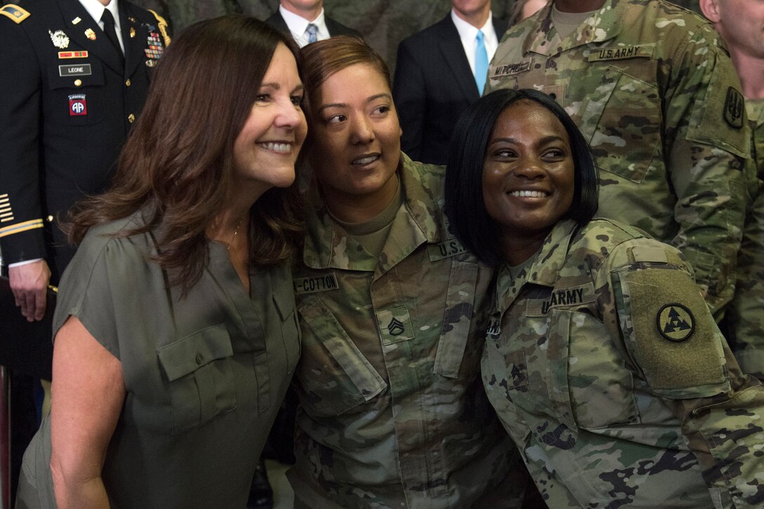 Karen Pence take a photo with soldiers.