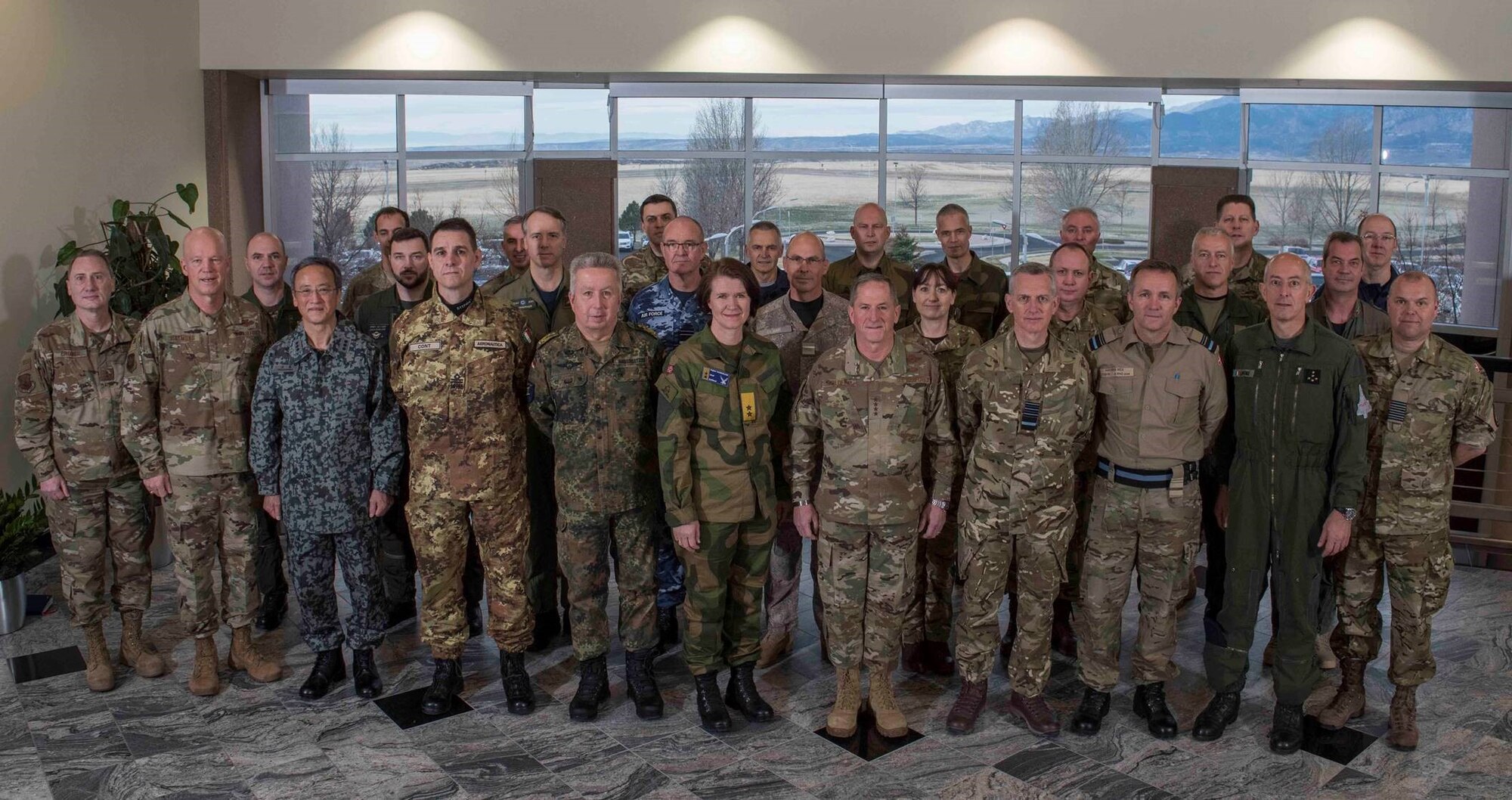 Air Force Chief of Staff Gen. David L. Goldfein (center) stands with air chiefs and senior staff from Australia, Canada, Denmark, France, Germany, Italy, Japan, Netherlands, New Zealand, Norway and the United Kingdom, April 11, 2019, during the first joint meeting of the chiefs to discuss operations in space in Colorado Springs, Colo.