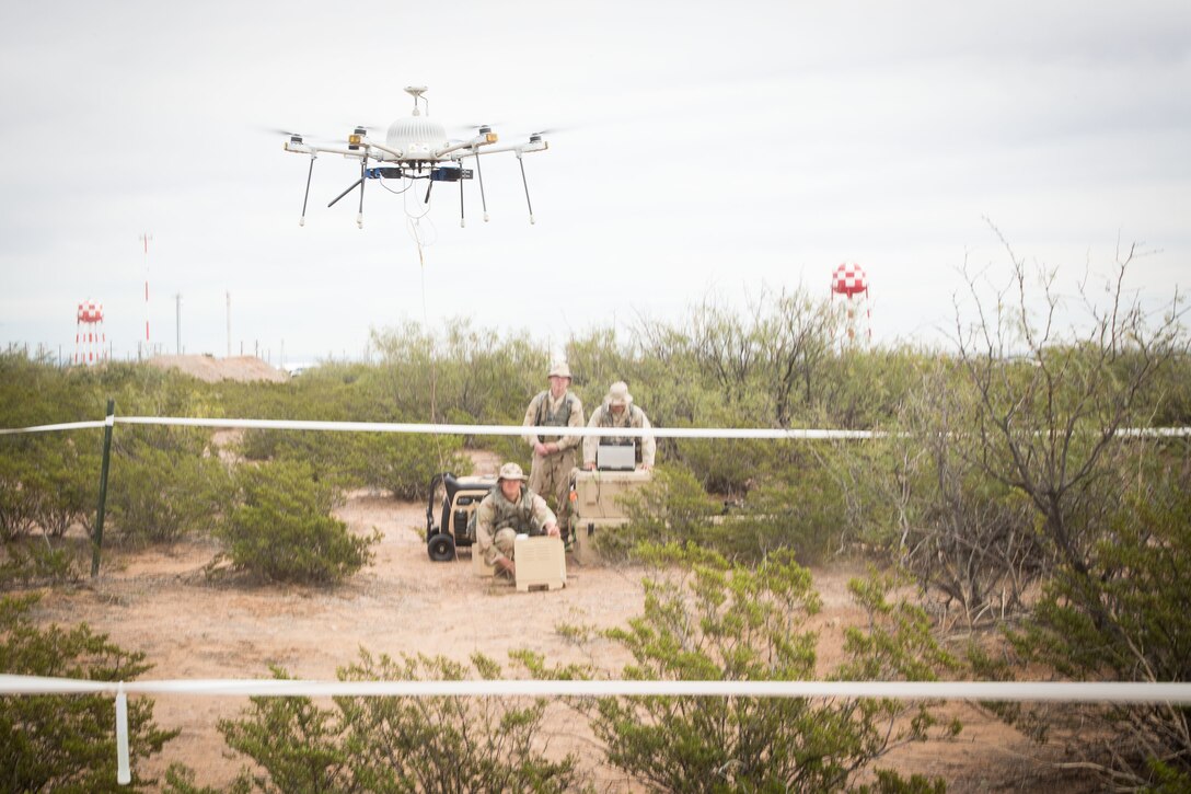 Soldiers operate drones.