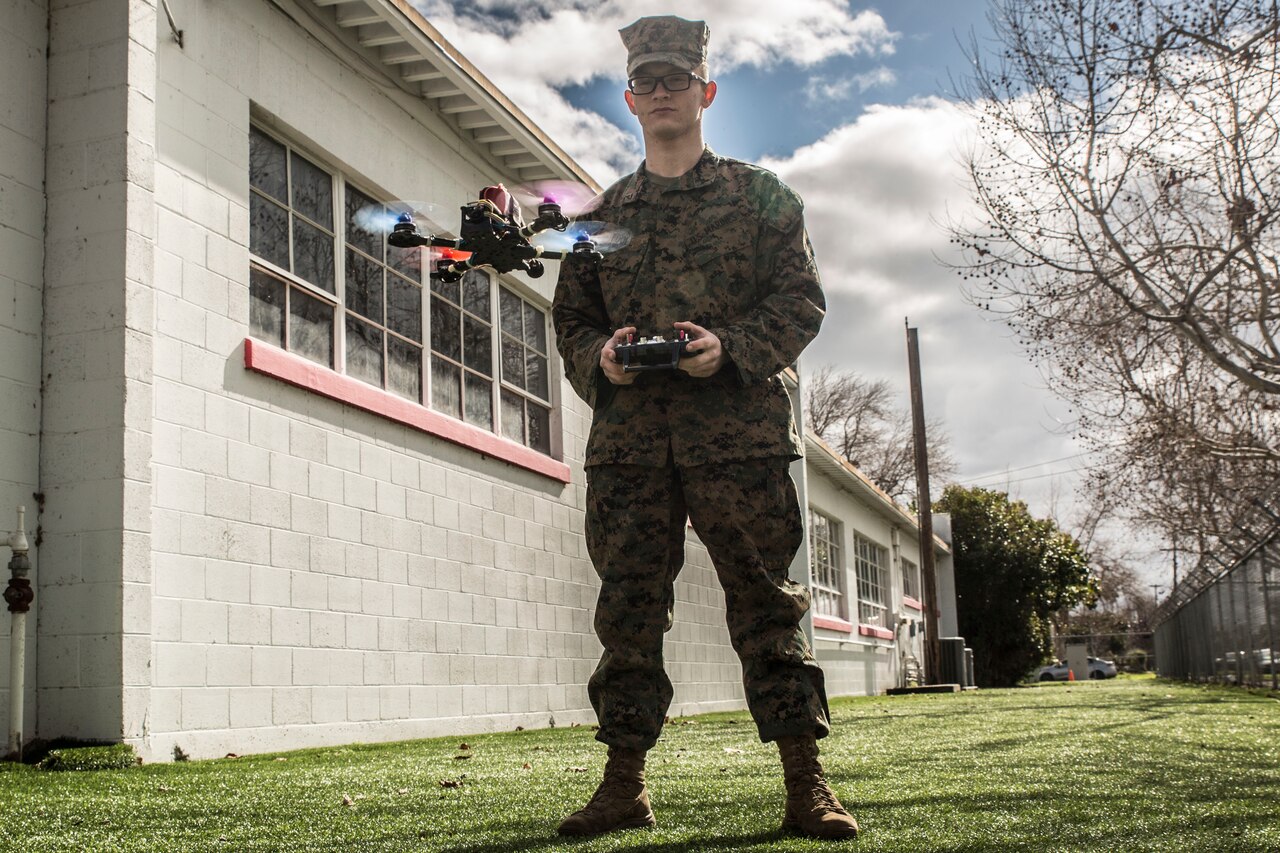 A Marine tests a drone.