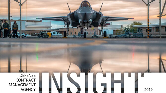 An F-35 sits in a hanger.