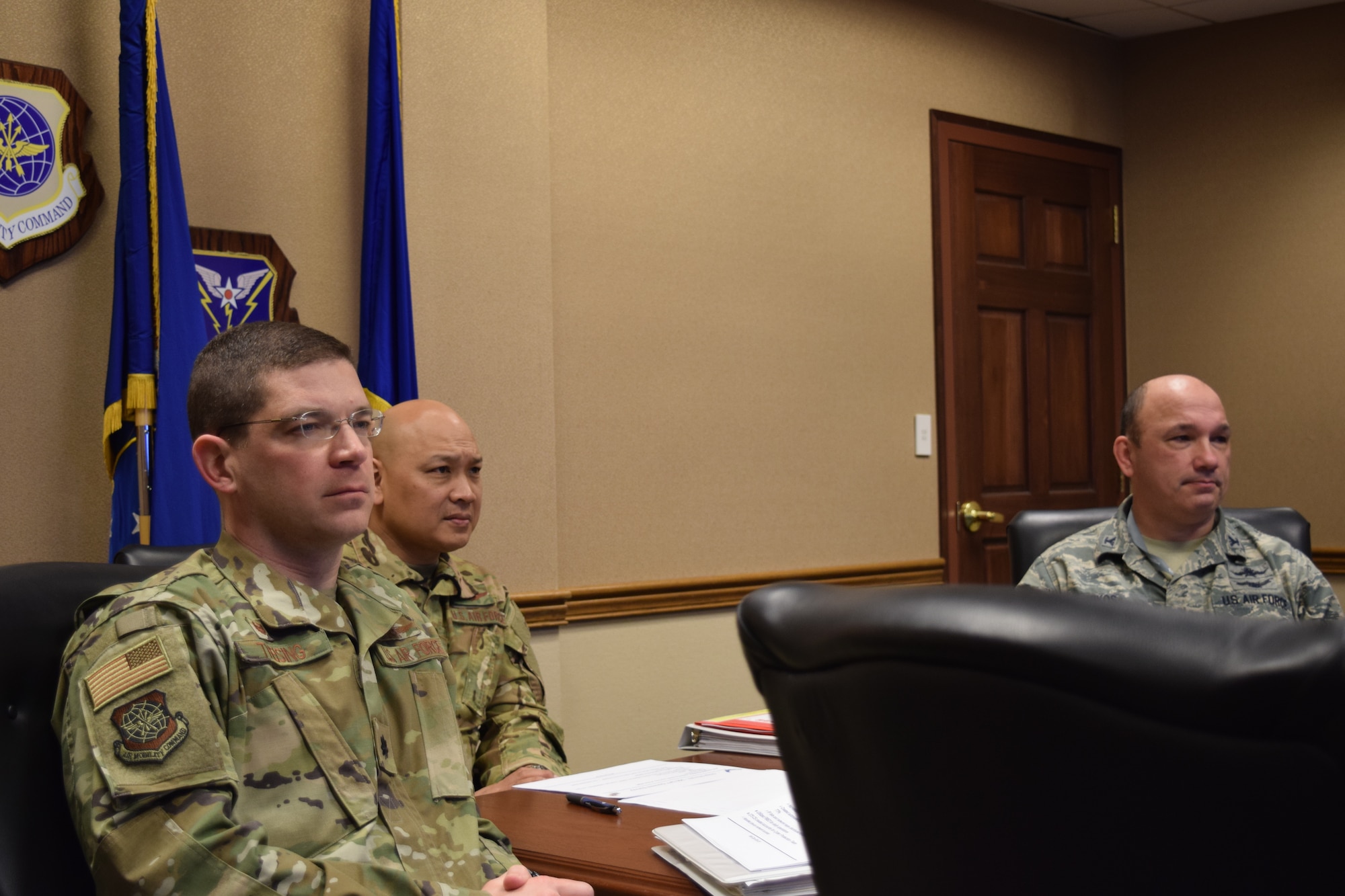 Lt Col Frank Theising 375th Communications Squadron Commander, Brig Gen Jimmy Canlas 618th Air Operations Center Commander, and Col Kyle Mikos Air Mobility Command Director of Cyberspace Forces were briefed at the conclusion of the exercise.
