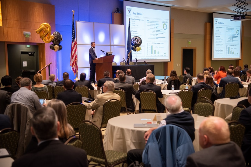 Naval Information Warfare Center (NIWC) Atlantic Executive Director Chris Miller speaks during the 50th Small Business Industry Outreach Initiative April 2, 2019, at Trident Technical College in Charleston, S.C.