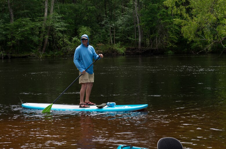 Earl Johnston, kayaking instructor, paddle boards on Black River near, Ridgeville, S.C., April 13, 2019.