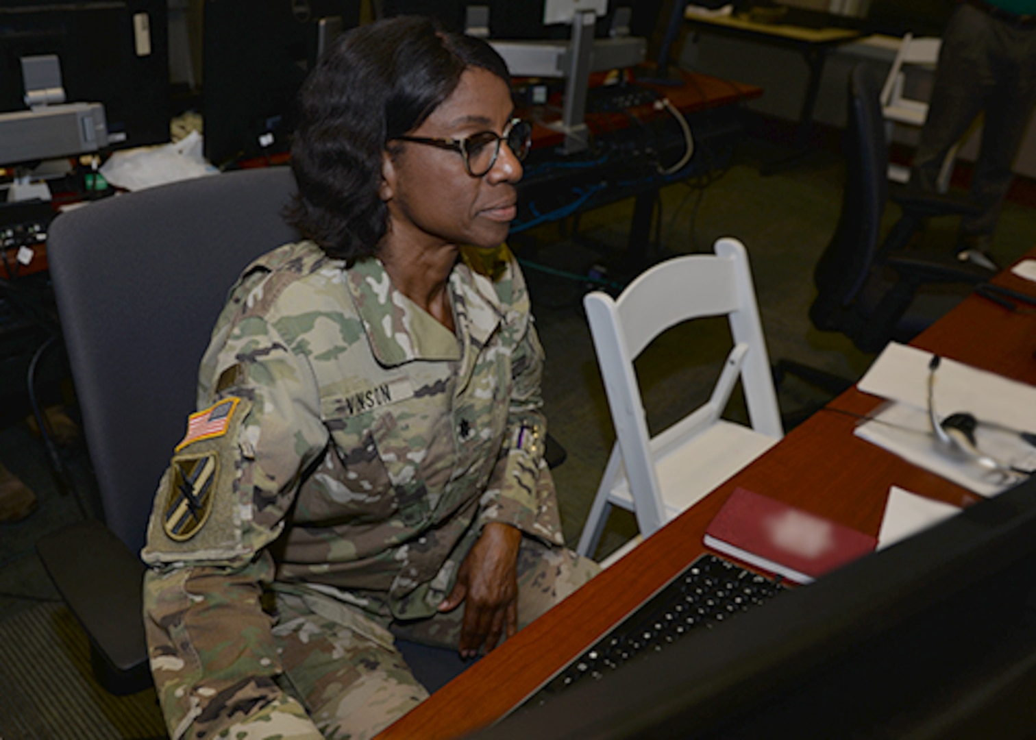 Lt. Col. Anita Vinson, U.S. Army, an exercise planner in U.S. Southern Command’s Engineering section conducts a systems check during exercise Integrated Advance 2019.