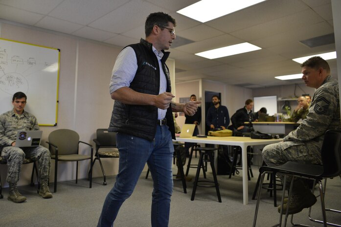 William Allen, co-founder of Harpoon Ventures, briefs senior leaders on the opportunities that AFWERX provides to Airmen during the Collider Demo.