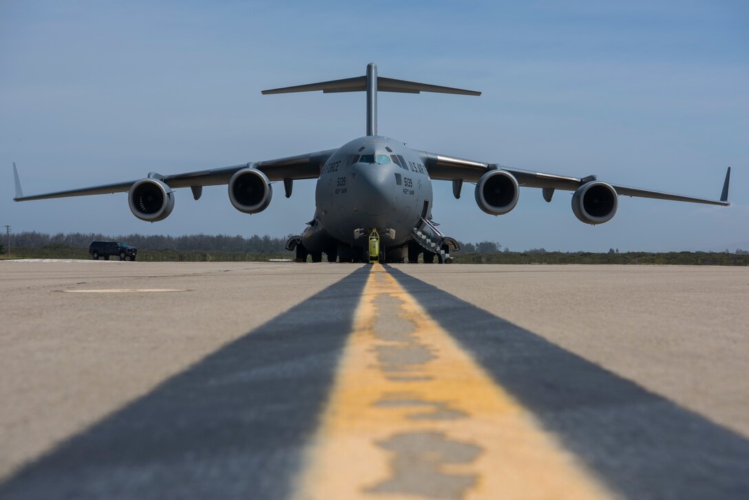 A C-17 Globemaster III, assigned to Wright-Patterson Air Force Base, Ohio, lands during exercise Patriot Hook 2019, April 11, 2019, at Vandenberg Air Force Base, Calif. The 5-day exercise provided realistic mission training for Air Force Reserve Command members and other United States Air Force aircrew. (U.S. Air Force photo by Airman 1st Class Aubree Milks)