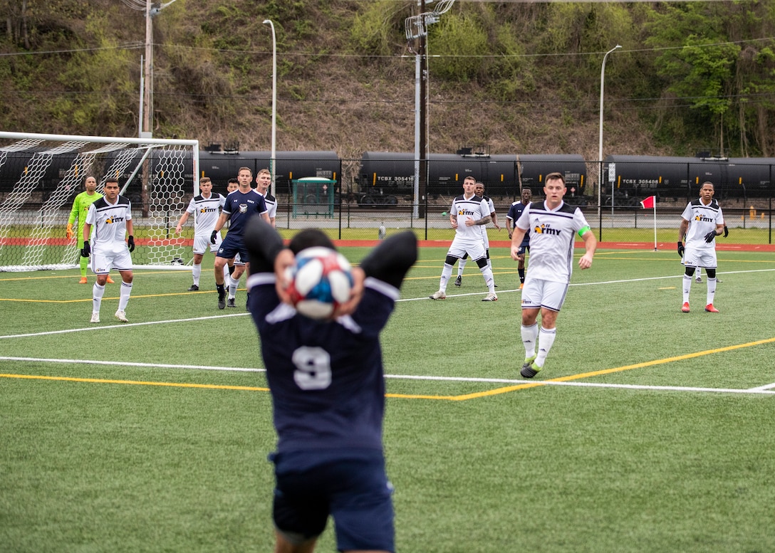 NAVAL STATION EVERETT, Wa. (April 16, 2019) - Petty Officer 2nd Class Devante Ecford, stationed at Marine Corp Air Station Yuma, Az., from the Navy soccer team throws the ball back in play during a second round match between Army and Navy at the Armed Forces Sports Men’s Soccer Championship hosted at Naval Station Everett. (U.S. Navy Photo by Mass Communication Specialist 2nd Class Ian Carver/RELEASED).