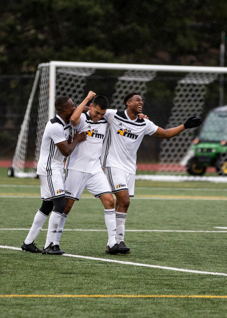 NAVAL STATION EVERETT, Wa. (April 16, 2019) - Players from the Army soccer team celebrate a goal aginst the Navy team during a second round match of the Armed Forces Sports Men’s Soccer Championship hosted at Naval Station Everett. (U.S. Navy Photo by Mass Communication Specialist 2nd Class Ian Carver/RELEASED).