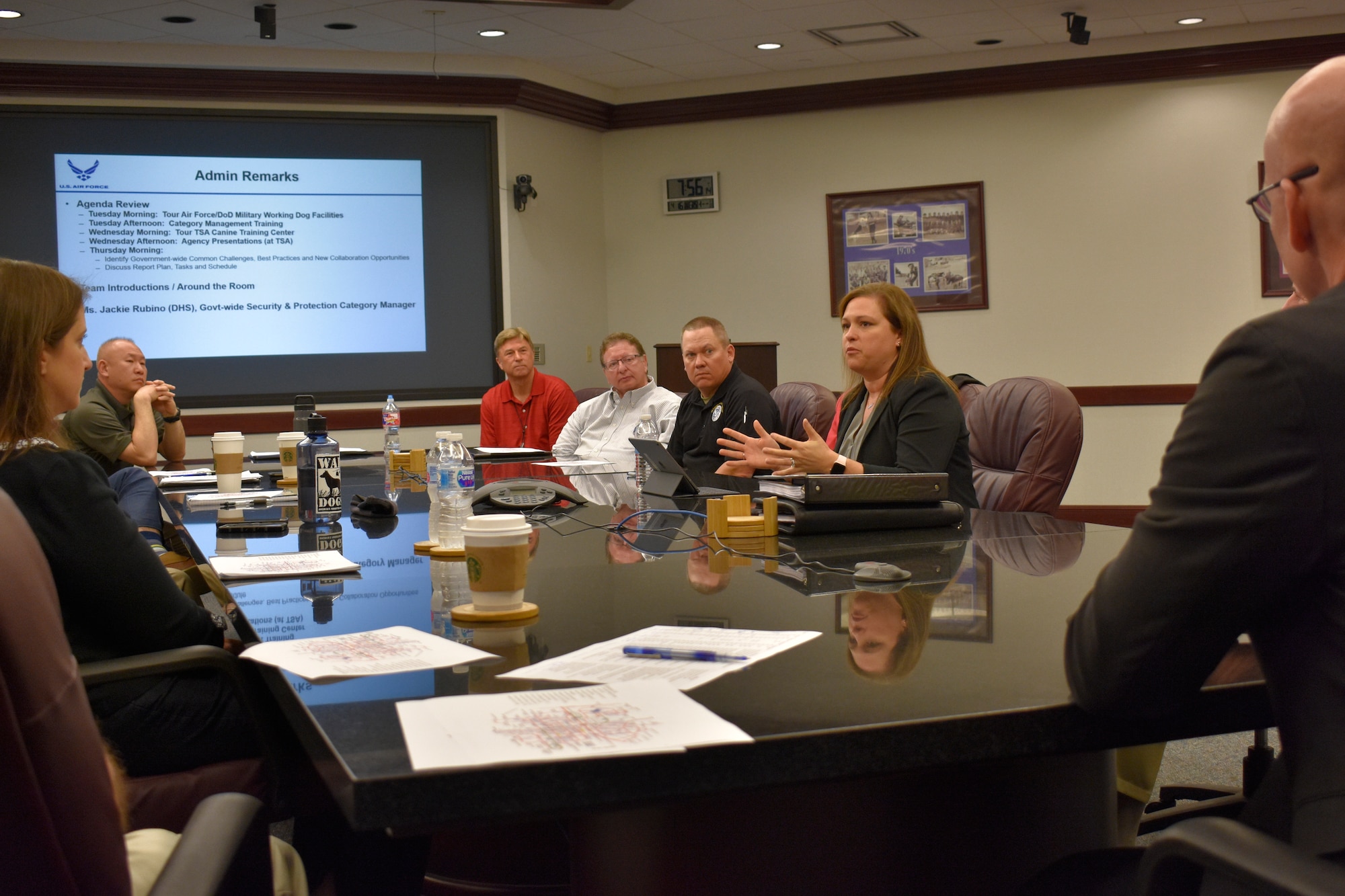 Jaclyn Smyth, Federal Security and Protection Category Manager for the Department of Homeland Security, talks with attendees of the government-wide working dog team kick-off meeting April 16, 2019, at the Air Force Security Forces Center Headquarters on Joint Base San Antonio-Lackland, Texas. Over three days, members of ten federal agencies toured Air Force and DoD Military Working Dog facilities and shared information about their working dog programs - including challenges and best practices - and identified collaboration opportunities. (U.S. Air Force photo by Shannon Carabajal)