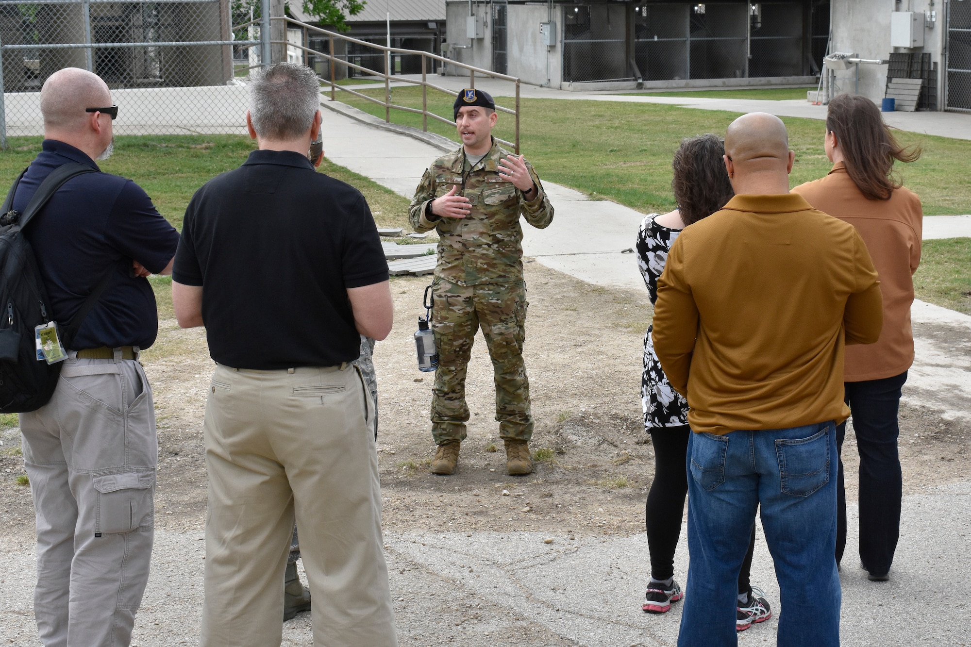 Master Sgt. Steve Kaun, Air Force Military Working Dog Program Manager, gives the government-wide working dog team members a tour of 341st Training Squadron’s military working dog kennels on Joint Base San Antonio-Lackland, Texas, April 16, 2019. The 341st TRS provides training to MWDs used in patrol, drug and explosive detection, and specialized mission functions for the DoD and other government agencies. (U.S. Air Force photo by Shannon Carabajal)