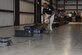 Clark Young, Transportation Security Administration trainer, takes his explosives detection dog Bina through a training exercise at TSA’s canine training center on JBSA-Lackland, Texas, April 17, 2019. Every year, TSA trains about 250 canine teams at JBSA-Lackland to operate in the aviation, multimodal, mass transit, and cargo environments. (U.S. Air Force photo by Shannon Carabajal)