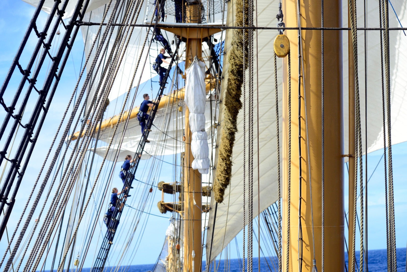 The crew and Coast Guard Academy cadets assigned to Coast Guard Cutter Eagle set sail stations in the Caribbean Sea on May 31, 2018. The 295-foot Barque Eagle is the flagship of the U.S. Coast Guard and serves as a training vessel for cadets at the Coast Guard Academy.