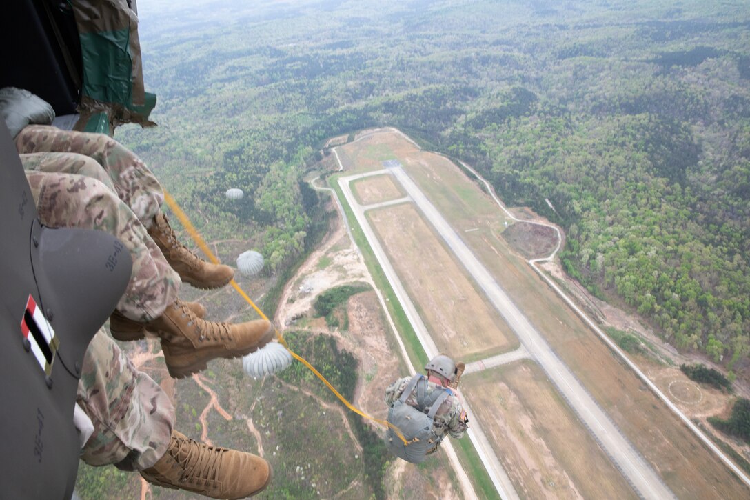 U.S. Army Reserve and National Guard Soldiers jump
