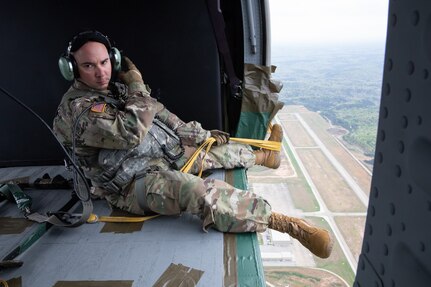 U.S. Army Reserve and National Guard Soldiers jump