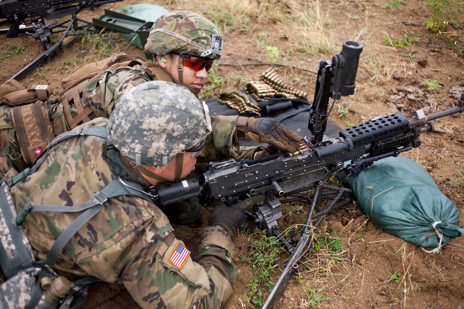 New York Army National Guard Soldiers assigned to Alpha Company, 1st Battalion, 69th Infantry Regiment, fire a Squad Automatic Weapon at Camp Santiago, Puerto Rico, on  April 13, 2019. While in Puerto Rico the Soldiers honed their fighting skills by practicing short-range marksmanship techniques.