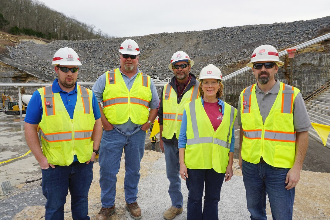 LANCASTER, Tenn. (April 18, 2019) – The U.S. Army Corps of Engineers recently began placing “roller-compacted concrete” to build a reinforcing berm downstream of Center Hill’s auxiliary dam.  This construction is the final major risk-reduction contract in the ongoing Center Hill Dam Safety Rehabilitation Project.