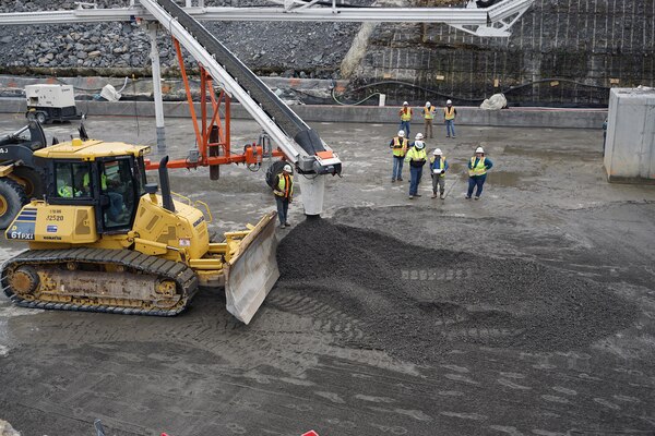 LANCASTER, Tenn. (April 18, 2019) – The U.S. Army Corps of Engineers recently began placing “roller-compacted concrete” to build a reinforcing berm downstream of Center Hill’s auxiliary dam.  This construction is the final major risk-reduction contract in the ongoing Center Hill Dam Safety Rehabilitation Project.