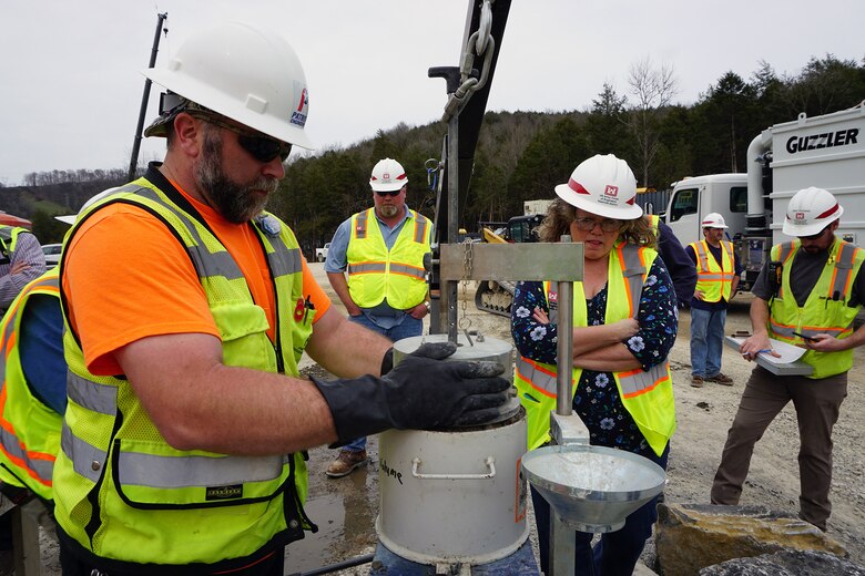 LANCASTER, Tenn. (April 18, 2019) – The U.S. Army Corps of Engineers recently began placing “roller-compacted concrete” to build a reinforcing berm downstream of Center Hill’s auxiliary dam.  This construction is the final major risk-reduction contract in the ongoing Center Hill Dam Safety Rehabilitation Project.