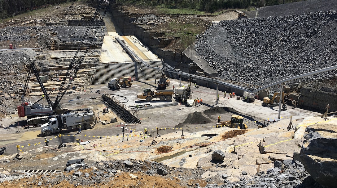LANCASTER, Tenn. (April 18, 2019) – The U.S. Army Corps of Engineers recently began placing “roller-compacted concrete” to build a reinforcing berm downstream of Center Hill’s auxiliary dam.  This construction is the final major risk-reduction contract in the ongoing Center Hill Dam Safety Rehabilitation Project.
