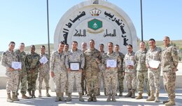 Participants and instructors pose for a photo after the completion of a United States Army and Jordan Armed Forces noncommissioned officer subject matter expert exchange in Amman, Jordan, April 6-10, 2019. Topics included the enlisted force structure, promotions, professional military education, performance feedback, evaluation processes, and career development for both armies. The U.S. and Jordan remain committed to a strong bilateral relationship built on common interests and mutual respect.