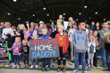 Approximately 100 Soldiers from Echo Battery, 1st Battalion, 145th Field Artillery, “Big Red” return from a 10-month Middle East deployment April 9.