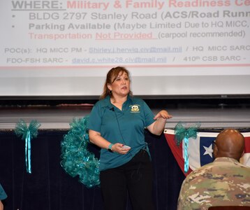 Shirley Herwig reviews the agenda for a stand down training event April 10 with uniformed and civilian members from contracting activities on Joint Base San Antonio-Fort Sam Houston as part of Sexual Assault and Prevention Awareness Month. Herwig is the Sexual Harassment/Assault Response and Prevention manager for the Mission and Installation Contracting Command.