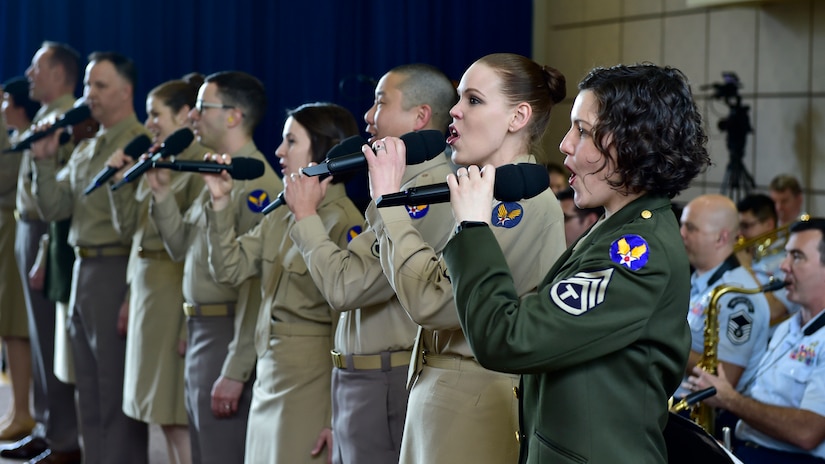 Members of the U.S. Air Force Concert Band and Singing Sergeants perform for an audience of military veterans during the DFW Honor Flight concert, at Joint Base Anacostia-Bolling, April 13, 2019. The concert honored military veterans from WWII, Vietnam and Korean War by playing music from the era. (U.S. Air Force photo by Staff Sgt. Cary Smith)