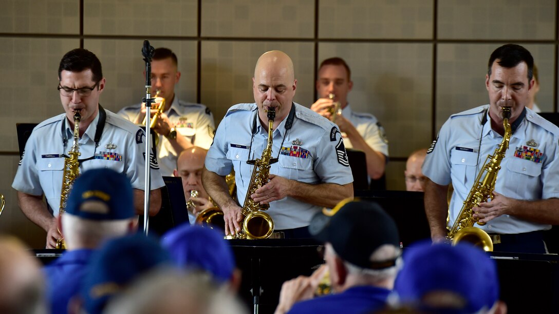 Members of the U.S. Air Force Concert perform for an audience of military veterans during the DFW Honor Flight concert, at Joint Base Anacostia-Bolling, April 13, 2019. The concert honored military veterans from WWII, Vietnam and Korean War by playing music from the era. (U.S. Air Force photo by Staff Sgt. Cary Smith)