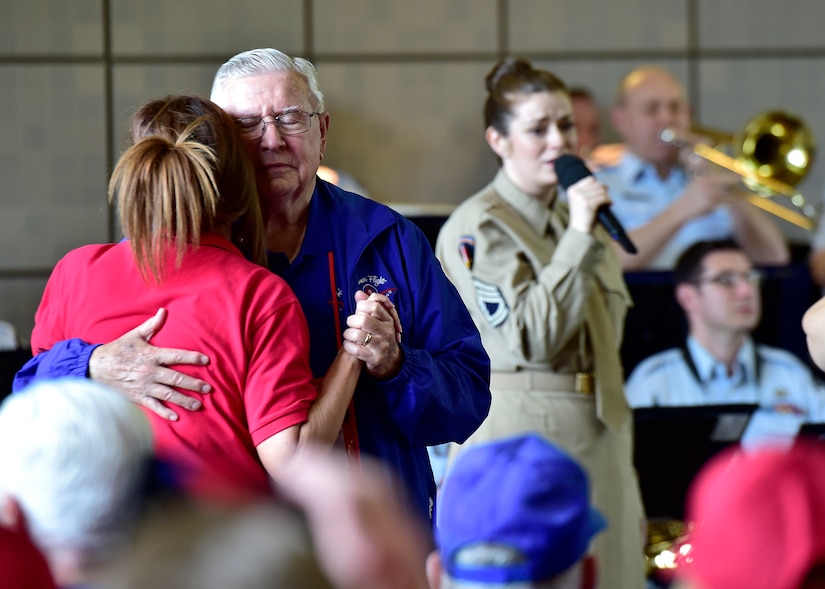 Attendees dance during the DFW Honor Flight concert, at Joint Base Anacostia-Bolling, April 13, 2019. The USAF Concert Band and Singing Sergeants honored military veterans from WWII, Vietnam and Korean War by playing music from the era. (U.S. Air Force photo by Staff Sgt. Cary Smith)