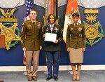 Command Sgt. Major of the Army Daniel A. Daily (left) and Command Sgt. Major Tabitha A. Gavia (right) U.S. Army Recruiting Command, recognize Sgt. 1st Class Ebony R. Thomas-Yarborough, Park North Station Commander, for her efforts leading her team of recruiters who put 51 individuals in the Army Between January and March 2019.