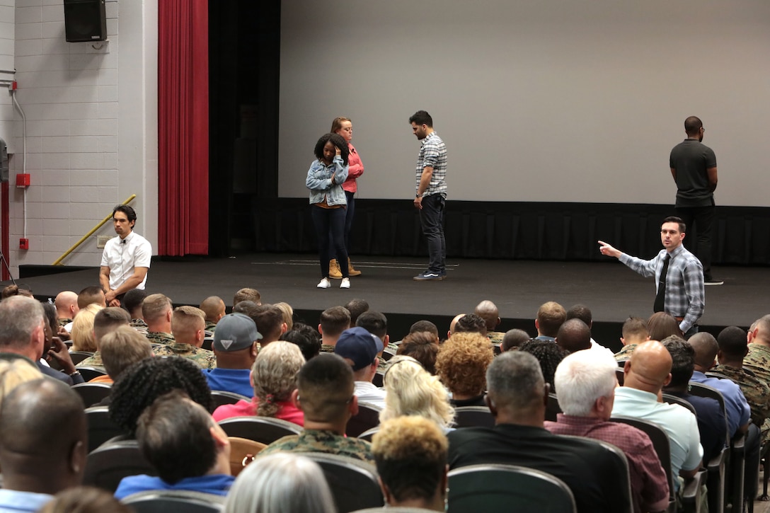 It was a packed house as hundreds of active-duty, civilian-Marines and other base personnel crammed into the Base Theater aboard Marine Corps Logistics Base Albany for the first-ever improv show on sexual assault, April 16. (U.S. Marine Corps photo by Re-Essa Buckels)