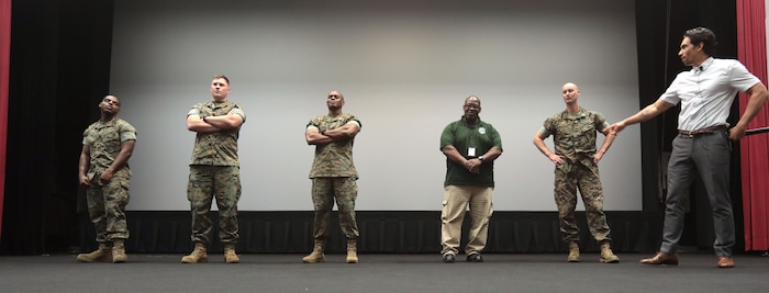 It was a packed house as hundreds of active-duty, civilian-Marines and other base personnel crammed into the Base Theater aboard Marine Corps Logistics Base Albany for the first-ever improv show on sexual assault, April 16. (U.S. Marine Corps photo by Re-Essa Buckels)