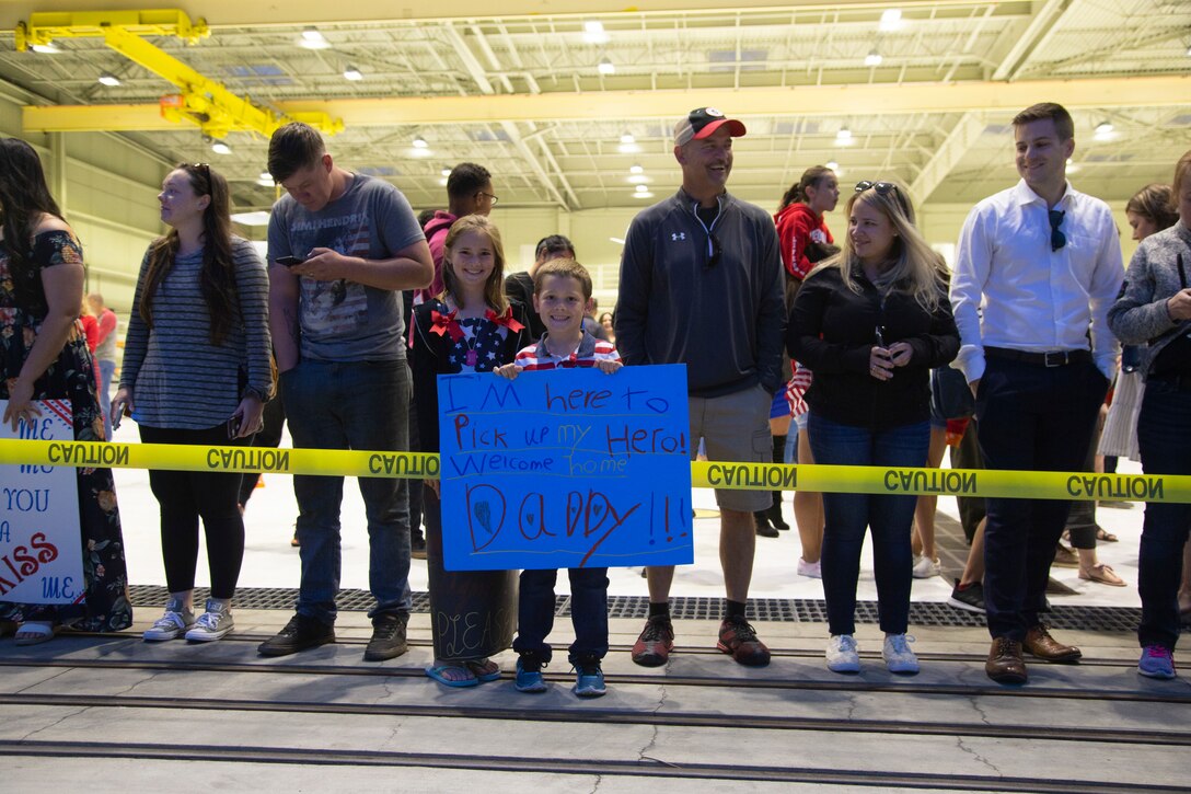 Family members await the arrival of their U.S. Marines with Marine Medium Tiltrotor Squadron (VMM) 165, Marine Aircraft Group 11, 3rd Marine Aircraft Wing, during a homecoming ceremony at Marine Corps Air Station Miramar, Calif., April 15, 2019. VMM-165 was attached to the Special Purpose Marine Air-Ground-Task Force-Crisis Response-Central Command (SPMAGTF-CR-CC) for the past eight months. The SPMAGTF-CR-CC is designed to move with speed and precision to support operations throughout the Middle East. (U.S. Marine Corps photo by Lance Cpl. Juan Anaya)