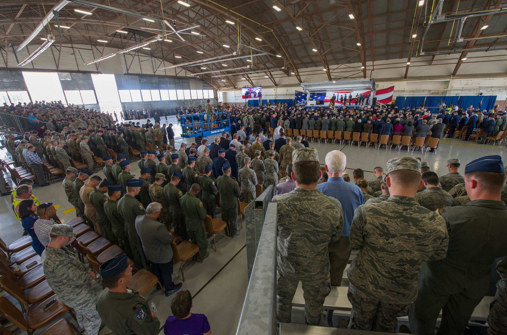 Attendees bow their heads during the invocation at a memorial service for retired U.S. Air Force Lt. Col. Richard “Dick” E. Cole at Joint Base San Antonio-Randolph, Texas, April 18, 2019.