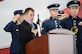 Attendees bow their heads during the invocation at a memorial service for retired U.S. Air Force Lt. Col. Richard “Dick” E. Cole at Joint Base San Antonio-Randolph, Texas, April 18, 2019.