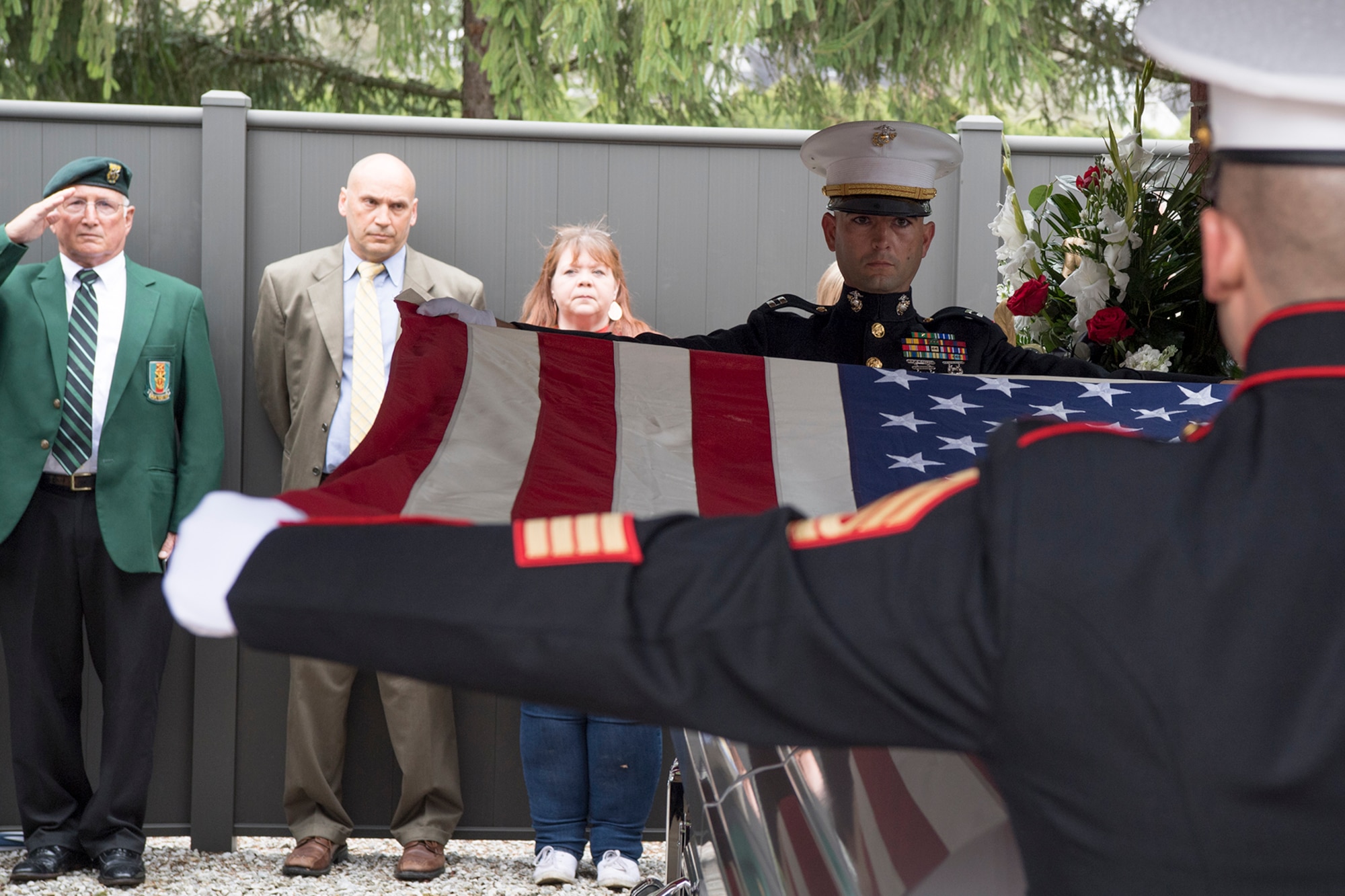 Capt. Pierce Virag and First Sgt. Philip Kent, Detachment 1, Communications Company, Combat Logistics Regiment 45, 4th Marine Logistics Group, honor guard team members perform a flag folding ceremony during the funeral of Pvt. Fred Freet April 18, 2019 at the Marion Indiana National Cemetery. The young Marine was killed in action during World War II, and declared by the military as unrecoverable killed in action until Aug. 6, 2018 when the U.S. Navy positively identified his remains. (U.S. Air Force Photo/Master Sgt. Ben Mota)