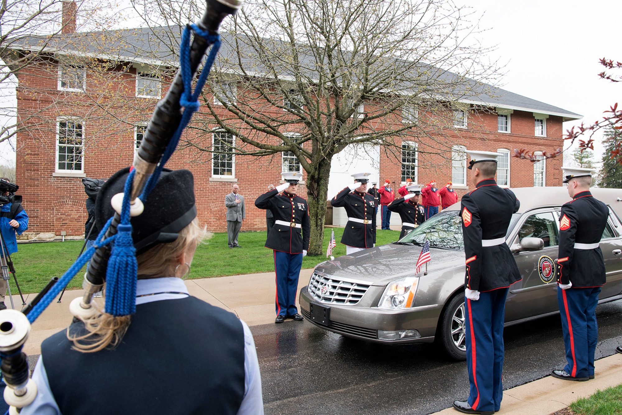 Marines from Detachment 1, Communications Company, Combat Logistics Regiment 45, 4th Marine Logistics Group, salute as a hearse arrives at the Marion National Cemetery, with the remains of Pvt. Fred Freet in Marion, Indiana April 18, 2019. The young Marine was killed in action during World War II, and declared by the military as unrecoverable killed in action until Aug. 6, 2018 when the U.S. Navy positively identified his remains. (U.S. Air Force Photo/Master Sgt. Ben Mota)