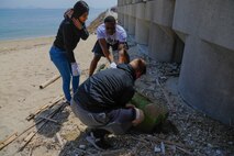 Days of Service: US service members clean up Yuu Beach
