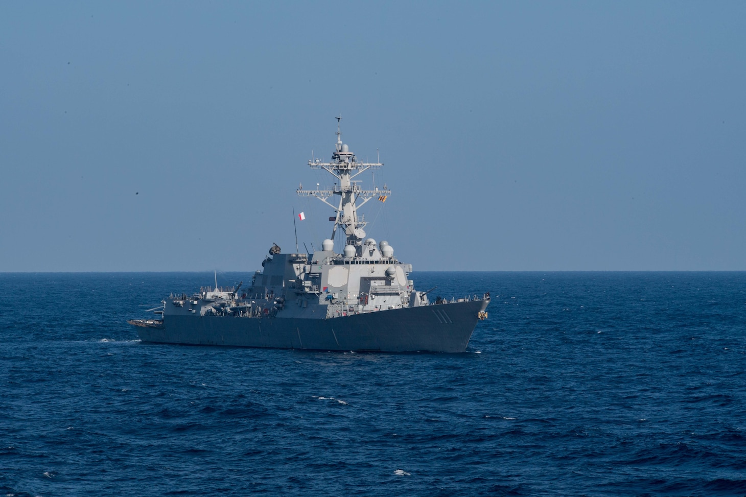 The guided-missile destroyer USS Spruance (DDG 111) cuts through the sea during the anti-submarine warfare exercise SHAREM 195 in the Arabian Sea, Dec. 18, 2018. Spruance is deployed to the U.S. 5th Fleet area of operations in support of naval operations to ensure maritime stability and security in the Central Region, connecting the Mediterranean and the Pacific through the western Indian Ocean and three strategic choke points.