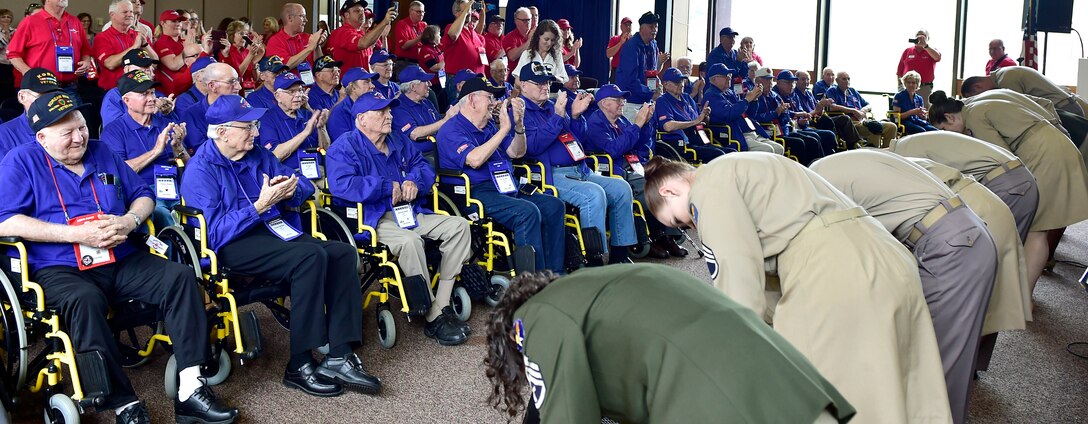 Members of the U.S. Air Force Singing Sergeants bow before an audience of military veterans during the DFW Honor Flight concert, at Joint Base Anacostia-Bolling, April 13, 2019. The concert honored military veterans from WWII, Vietnam and Korean War by playing music from the era. (U.S. Air Force photo by Staff Sgt. Cary Smith)