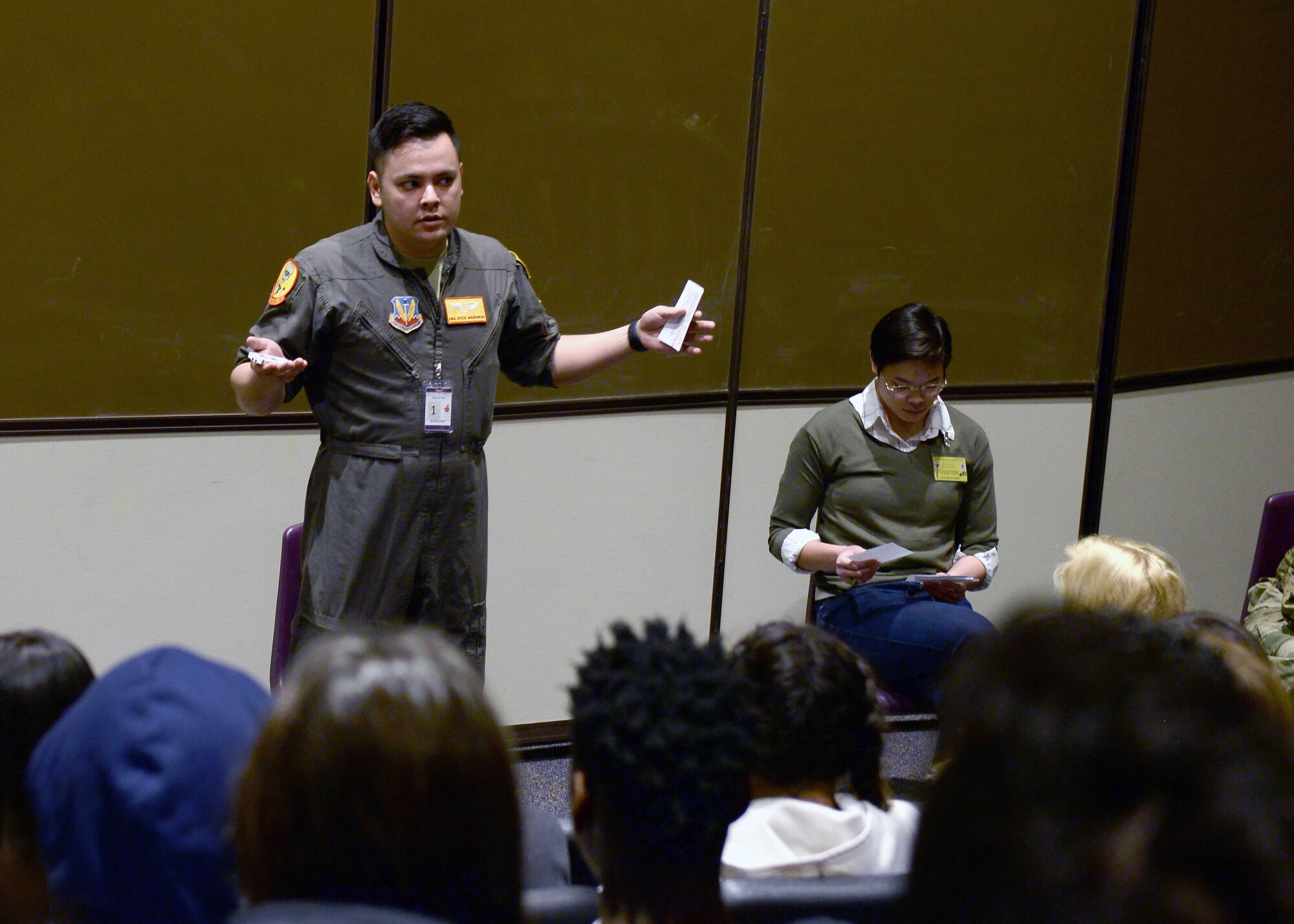 U.S. Air Force Senior Airman Jessie, 55th Intelligence Support Squadron, speaks to a crowd of high school students April 10, 2019, during World Language Week at Bellevue West High School, Nebraska.Students who spoke Spanish, French, German, and Latin were able to ask questions to the panel of linguists from the 97th Intelligence Squadron and 55th Intelligence Squadron. (U.S. Air Force photo by Charles J. Haymond)