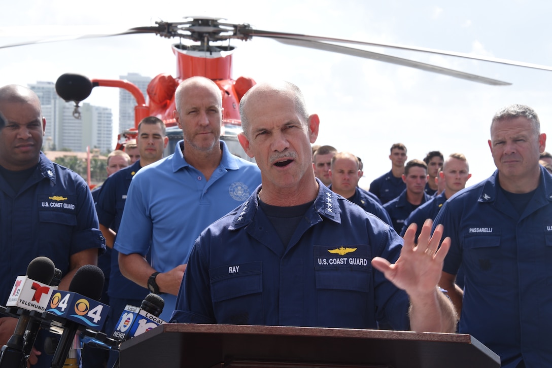 Admiral Charles Ray speaks during a press briefing on the flight deck of Coast Guard Cutter Bear (WMEC-901) before a drug offload April 18, 2019 at Port Everglades, Florida.