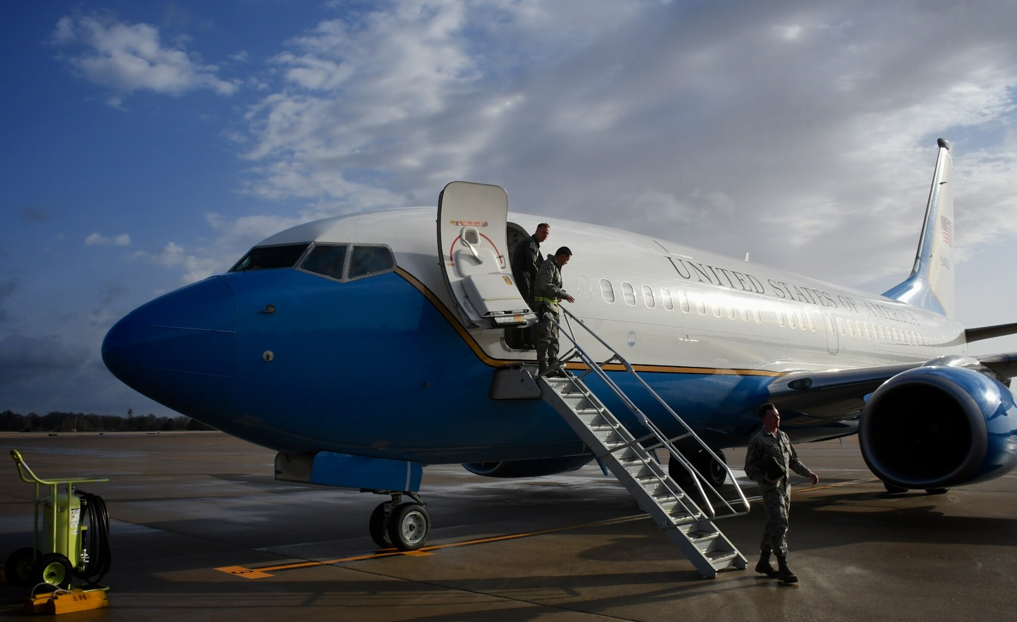 932nd Airlift Wing operators and maintainers check a C-40C before a mid-morning mission at Scott Air Force Base, Illinois.  The reservists and civil service maintainers are constantly executing their mission.  As the Airmen watching over the fleet at Scott, the 932nd Airlift Wing's Maintenance Group (MXG) is responsible for leading people who are always training and equipping to inspect, maintain and repair Air Force Reserve Command C-40C planes. The 932nd MXG's management of resources improves the wing's professionalism and enables the 932nd Operations Group's C-40C pilots to fly distinguished visitor (DV) airlift missions around the world, anywhere they are needed by the nation's leaders. The Illinois unit, which is part of 22nd Air Force, under Air Force Reserve Command, flies four of the C-40C planes. (U.S. Air Force photo by Lt. Col. Stan Paregien)