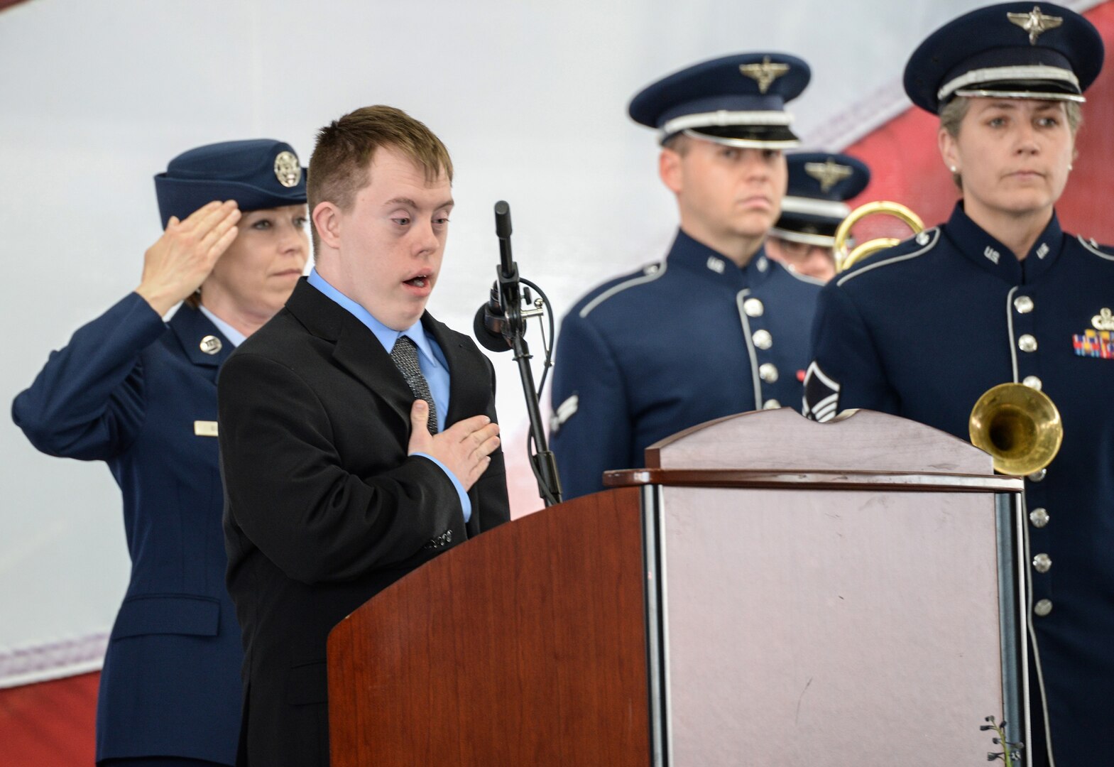 Aaron Cole, a grandson of retired U.S. Air Force Lt. Col. Richard “Dick” E. Cole, sings the national anthem during a memorial service for his grandfather at Joint Base San Antonio-Randolph April 18. Cole, the last surviving Doolittle Raider, was among 80 Airmen who took part in the storied World War II Doolittle Tokyo Raid and was a founding Airman of the USAF Special Operations community