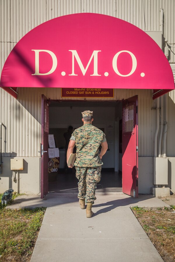 U.S. Marines visit the Distribution Management Office (DMO) to ask questions about their upcoming moves on Marine Corps Base Camp Pendleton, California, April 16 2019. Transitioning service members go to DMO to receive services such as shipment, receipt, pickup, delivery and storage of all personal property. (U.S. Marine Corps photo by Cpl. Gabino Perez)