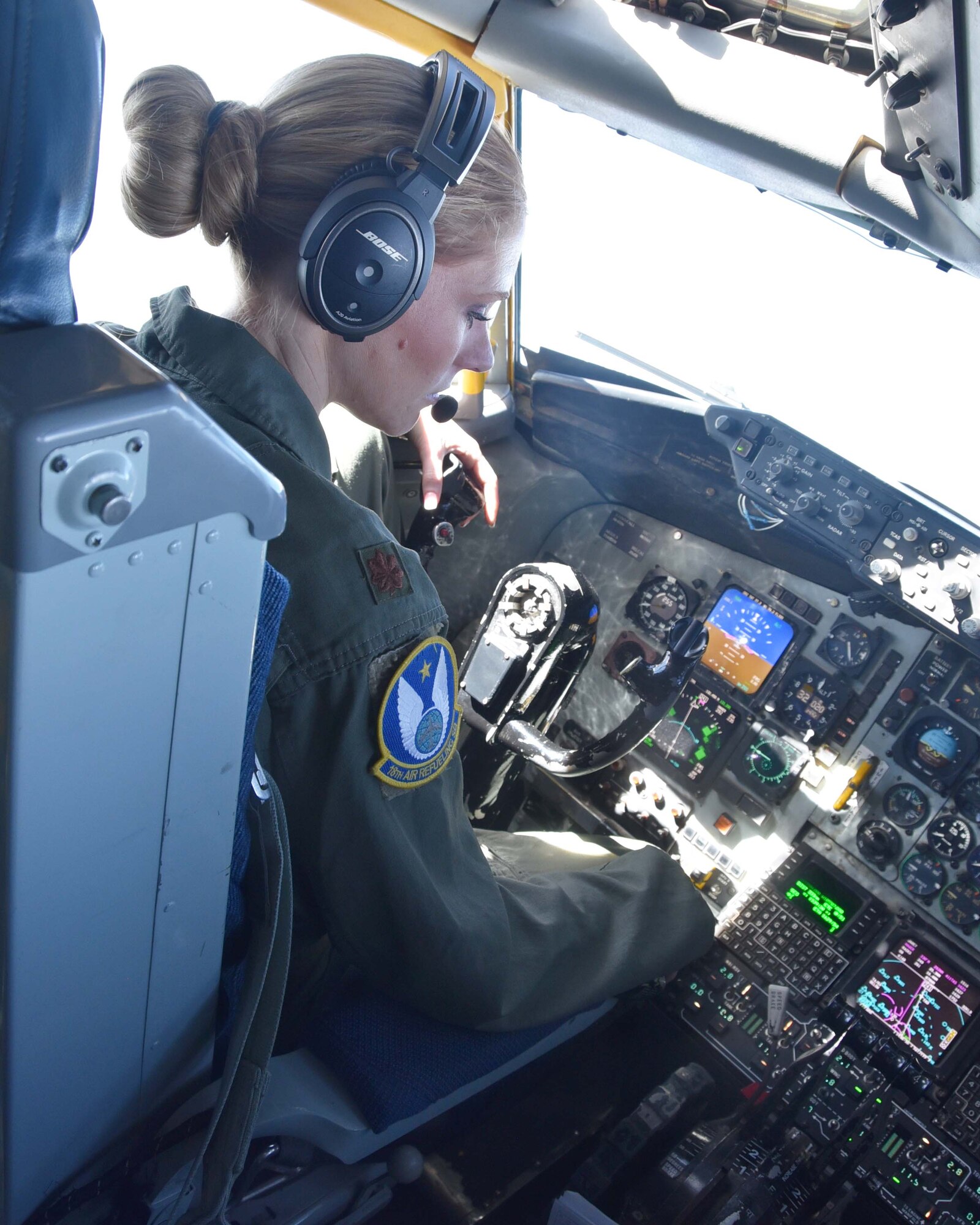 Maj. Monica Riggs, 18th Air Refueling Squadron chief pilot, flys a KC-135 Stratotanker during an 'unmanned' flight, April 9, 2019. Riggs was part of a five-person, all-female aircrew. During the flight, the crew performed air refueling for F-16 Fighting Falcons from the 54th Fighter Squadron out of Holloman Air Force Base, N. M.