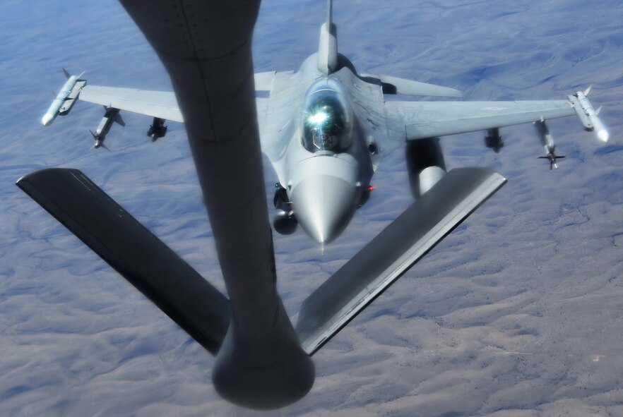 An F-16 Fighting Falcon from the 54th Fighter Squadron out of Holloman Air Force Base, N.M., approaches the boom of a KC-135 Stratotanker from McConnell AFB, Kan.,  April 9, 2019.  During the flight, the KC-135 crew refueled five total F-16s and made 12 contacts.